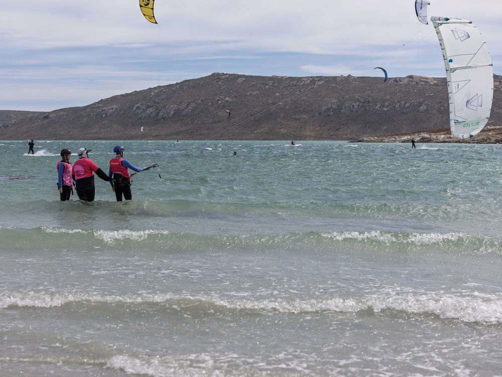 Two students in Obsession Kiting vests during a lesson on the lagoon